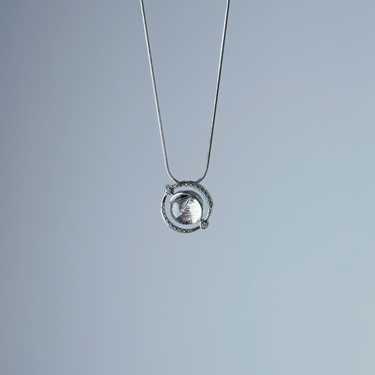 Natural Gibeon Meteorite Silver Planet Spinner Necklace