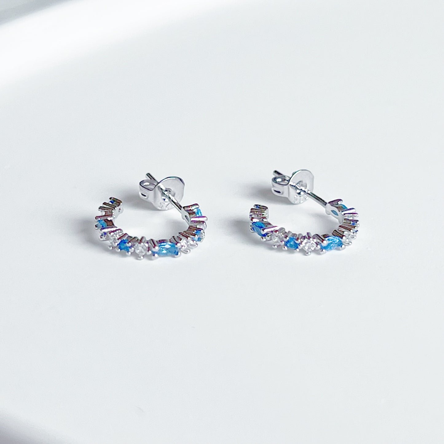 Silver Blue Topaz Mini Hoop Earrings - December Birthstone-Ninaouity