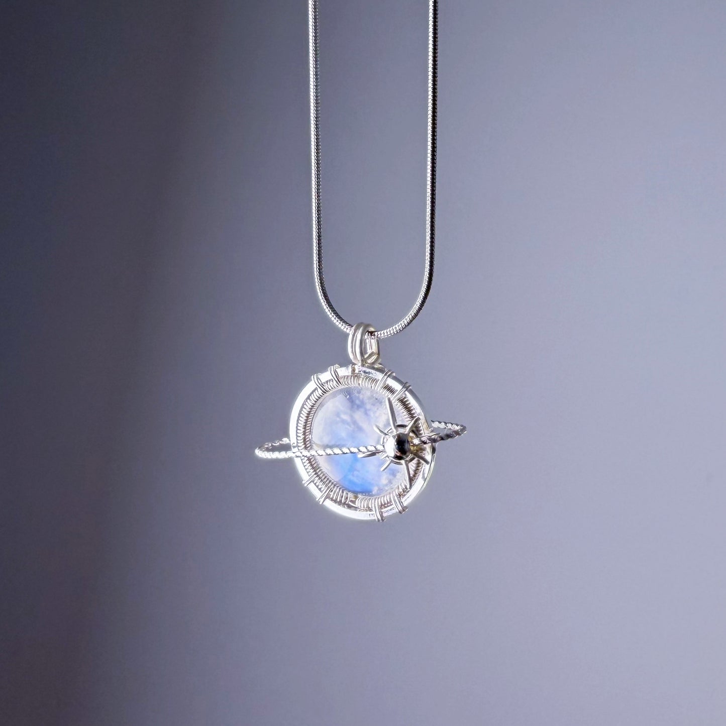 Quartzberry - Natural Blue Moonstone Silver Planet Wire Wrapped Necklace
